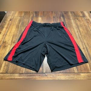 Pair of red and black athletic shorts